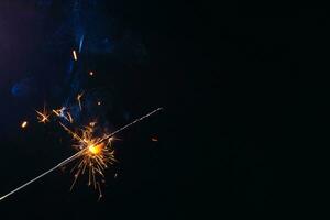 closeup view of burning sparkler photo