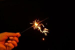 closeup view of burning sparkler photo