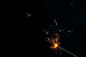 closeup view of burning sparkler photo