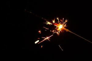 closeup view of burning sparkler photo