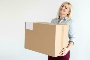 picture of attractive businesswoman delivering cardboard box photo