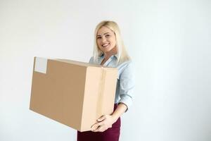 Moviente casa, Moviente oficina, caja. mujer con caja foto