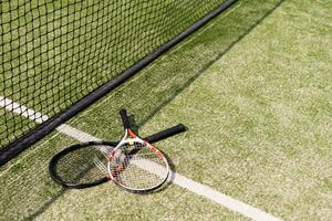 Tennis net and court. Playing Tennis. Healthy lifestyle photo