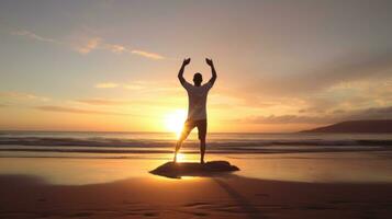 AI generated A man doing yoga on a beach, with the ocean and sunrise in the background photo