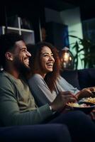 AI generated A young couple holding hands while sitting on a couch, watching a romantic comedy on TV photo