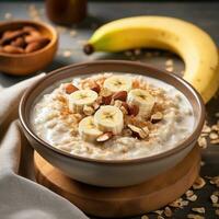 AI generated A bowl of creamy oatmeal with sliced banana, honey, and chopped walnuts photo