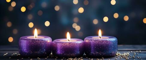 AI generated lit candles on a dark background with bokeh glow photo