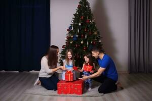 AI generated happy family with Merry Christmas magic gift near tree at evening at home photo