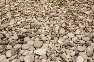 a large pile of rocks and gravel on the ground photo