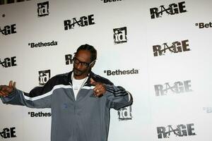 LOS ANGELES  SEPT 30  Snoop Dogg aka Calvin Broadus arriving at  the RAGE Game Launch at the Chinatowns Historical Central Plaza on September 30 2011 in Los Angeles CA photo