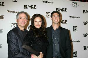 LOS ANGELES  SEPT 30  Lynda Carter husband son arriving at  the RAGE Game Launch at the Chinatowns Historical Central Plaza on September 30 2011 in Los Angeles CA photo