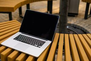 laptop in coffee shop - vintage effect style pictures photo