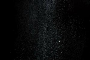 Abstract design of white powder cloud isolated on black, dark background. Abstract design of white dust cloud. Particles cloud screen saver, wallpaper. photo