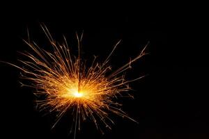 closeup view of burning sparkler photo