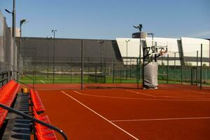 Outdoor public empty basketball court photo