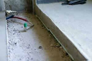 grooves in the concrete floor in the apartment photo