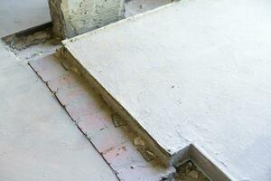 grooves in the concrete floor in the apartment photo