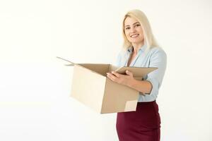 picture of attractive businesswoman delivering cardboard box photo