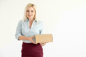 picture of attractive businesswoman delivering cardboard box photo