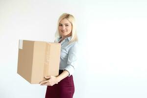 picture of attractive businesswoman delivering cardboard box photo