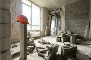 Abandoned house interior, dirty room, rotten peeled walls. photo