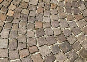 a close up of a cobblestone walkway photo