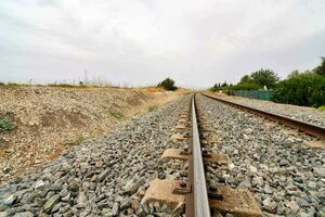 railroad tracks in the desert photo