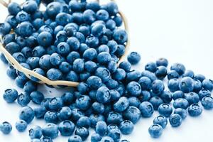 Tasty blueberries isolated on white background. Blueberries are antioxidant organic superfood. photo