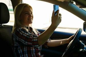 Confident and beautiful. attractive young woman in casual wear driving a car photo