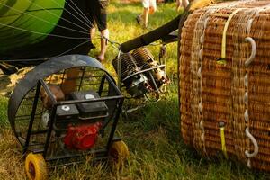 Hot air balloon basket on grass background. This has clipping path. photo