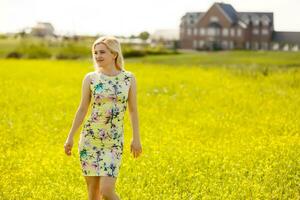 woman standing in the field photo