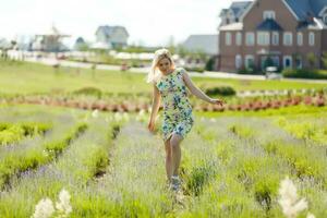 Woman standing on a lavender field photo