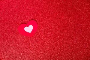 heart on a red background for a greeting card or banner for Valentine's Day copy space photo