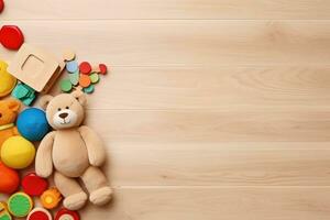 AI generated Top view of kids toys frame on wooden background with copy space. photo