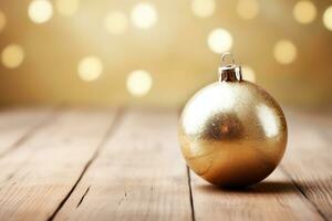 ai generado dorado Navidad pelota en un ligero de madera antecedentes con festivo borroso bokeh antecedentes foto