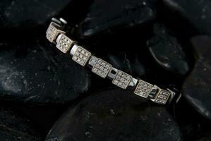 Elegance in Detail - Diamond Bracelet on Textured Stones photo