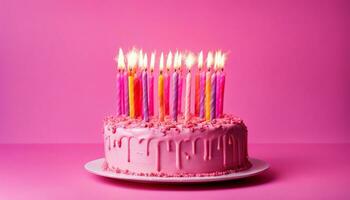 AI generated Pink birthday cake with many pink birthday candles and sparklers against a pink background with copy space photo