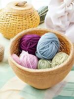 AI generated Multi-colored tangles of yarn in a wicker basket on the table. tea in a beautiful white cup. japanese style wabi sabi. home comfort, handicraft. ai generated photo