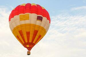 hot air balloon over blue sky. Composition of nature and blue sky background photo