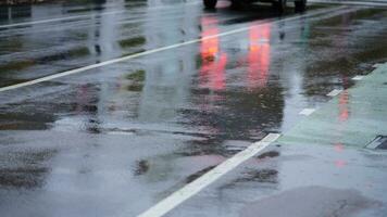 The wet road with the reflections in the rainy day photo