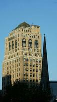 The city view with the old buildings and architectures under the warm sunlight photo