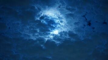 The moon night view with the full moon and clouds in the sky photo