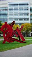 The beautiful campus autumn view with the colorful trees and leaves in the rainy day photo