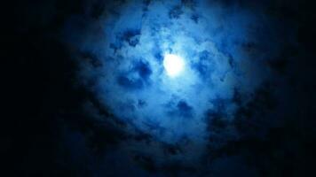 The moon night view with the full moon and clouds in the sky photo