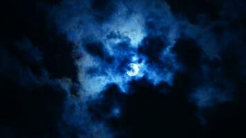 The moon night view with the full moon and clouds in the sky photo