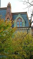 The beautiful campus view with the colorful trees and leaves in autumn photo