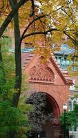 The beautiful campus view with the colorful trees and leaves in autumn photo