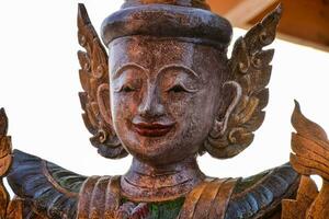 Detail of Buddhist temple sculpture photo