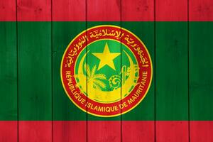 Flag and coat of arms of ISLAMIC REPUBLIC OF MAURITANIA on a textured background. Concept collage. photo