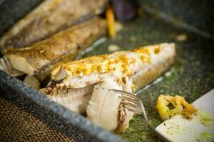 fish baked in the oven with spices, spices photo